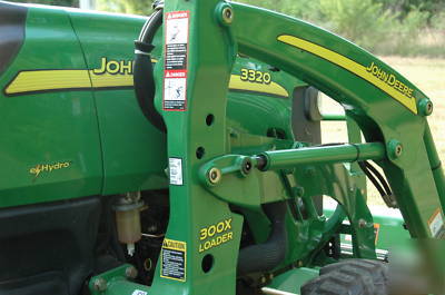 2007 john deere 3320, barely used, lots of attachments 