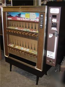 National 222 cigarette vending machine-takes 1's & 5's 