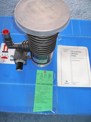 New varian m-4 diffusion pump, with parts unit