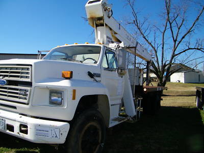 1989 FORDF800 flatbed with NATIONAL556 boom truck crane