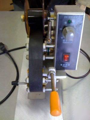 Poly bag labeler and date encoder