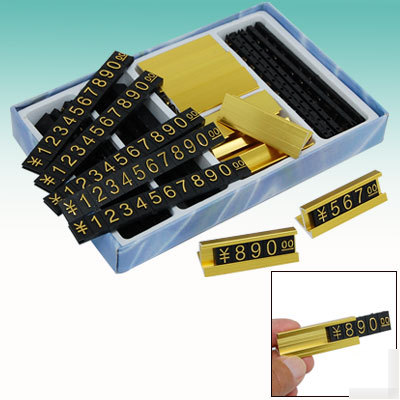 Retailing price tags black board gold-tone printer word