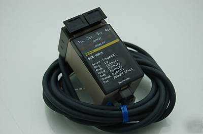 Omron E3X-NM11 4 channel teaching optical fiber sensor