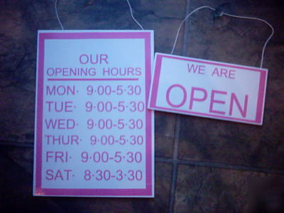 Open-closed +open hours sign,signs,window,shop,pink&wht