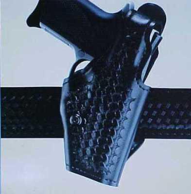 Used rh black b-weave safariland holster sig P228 P229