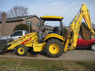 New 2005 holland LB75.b backhoe with only 440 hours