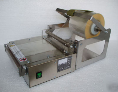 DELTA200 overwrapping machine for perfume cartons. 