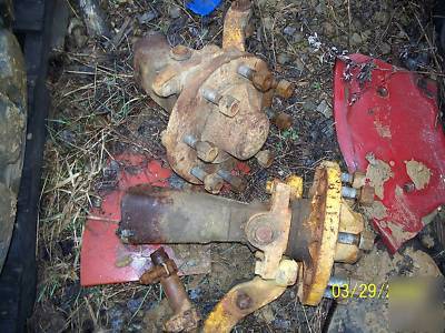 Parts for a ford 555 backhoe, kingpins and hubs