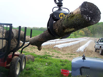 Log trailer with grapple loader--pull behind your truck
