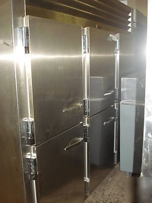 Traulsen used pass-thru refrigerator solid & glass door