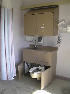 Wall counter,cabinet w/ fold out toilet and ss lavatory