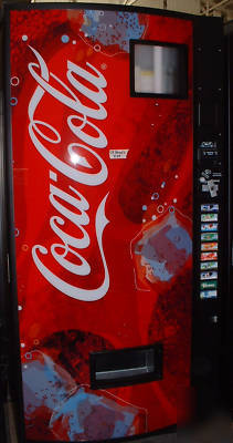 Vendo 840 coke soda water bottle can vending machine