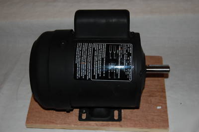 New .75 horse power electric motor in the box.