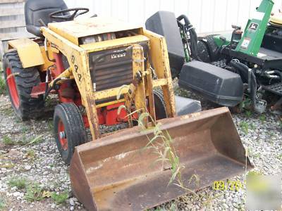 Case 644 lawn tractor w/ loader yellow in color