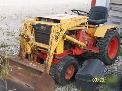 Case 644 lawn tractor w/ loader yellow in color