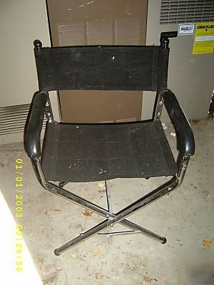 Chrome director's chair with strong black fabic, folds
