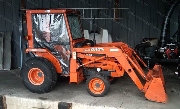 Kubota L2500DT tractor with front loader & cab