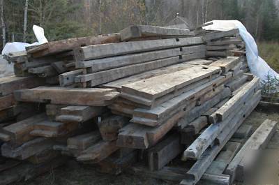 Reclaimed hand-hewn log siding (circa 1800 - 1850) 