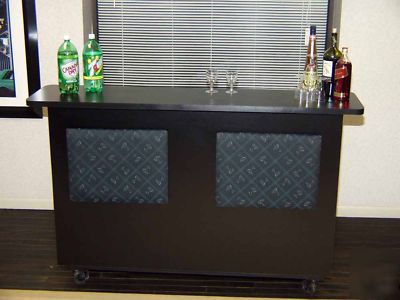 Portable bar with ice tray and bottle rack