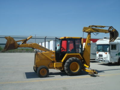 1987 john deere 510B loader,backhoe enclosed cab, ready