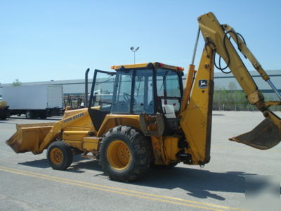 1987 john deere 510B loader,backhoe enclosed cab, ready