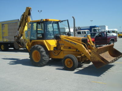 1987 john deere 510B loader,backhoe enclosed cab, ready