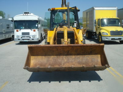 1987 john deere 510B loader,backhoe enclosed cab, ready