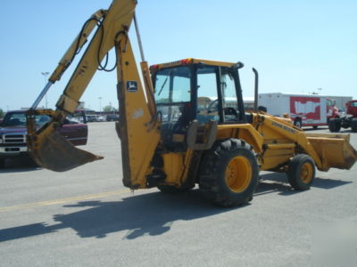 1987 john deere 510B loader,backhoe enclosed cab, ready