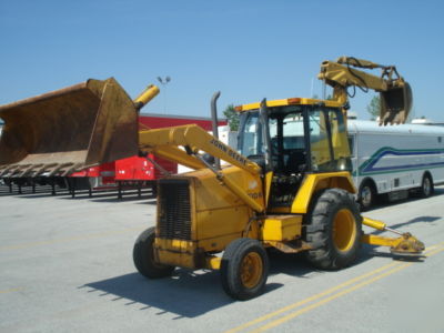 1987 john deere 510B loader,backhoe enclosed cab, ready