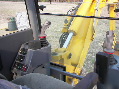Wow--2003 multi job 360 degree back hoe loader must see