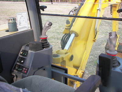 Wow--2003 multi job 360 degree back hoe loader must see