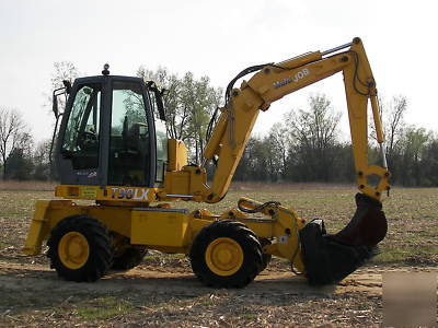 Wow--2003 multi job 360 degree back hoe loader must see