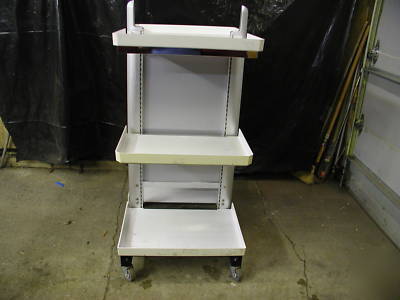 Adjustable store shelf on wheels