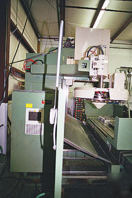 #8513 - mighty comet vmc-1250G cnc vmc