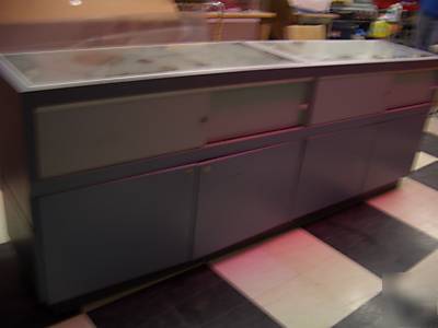 Double-wide display showcase. storage underneath, locks