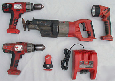 Milwaukee V28, 1-sawzall, 2-hammer drills, 1-charger