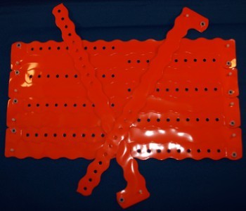 100 orange wave edge snap vinyl wristbands event band