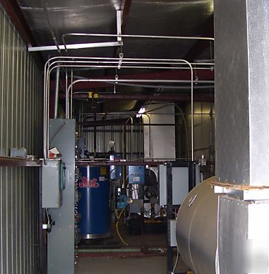 Dual unitemp lumber dry kilns, 100K board feet capacity