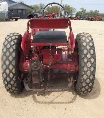 Ih cub lo boy mowing tractor