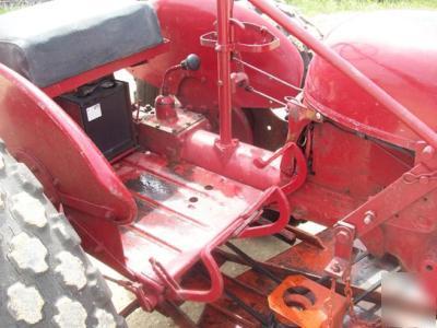 Ih cub lo boy mowing tractor