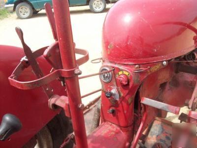 Ih cub lo boy mowing tractor