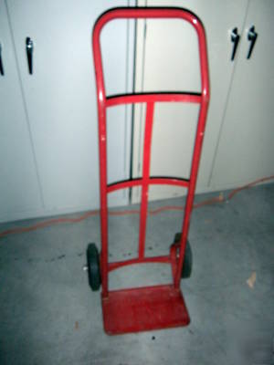Used small 2 wheel dollie/hand truck, hard tires, w/war