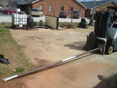 Carpet pole attachment for forklift