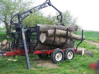 Log trailer with grapple loader--pull behind your truck