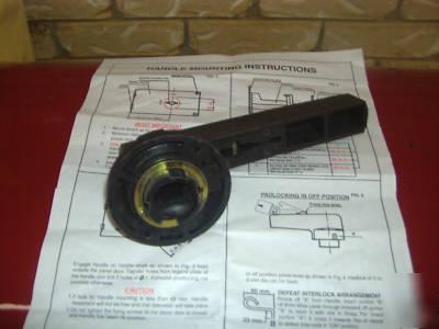 Control panel interlock handle 