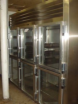 Traulsen used pass-thru refrigerator solid & glass door