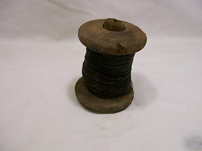 Vintage wooden spool of varnished copper magnet wire