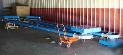 Floveyor conveyor system with storage hoppers