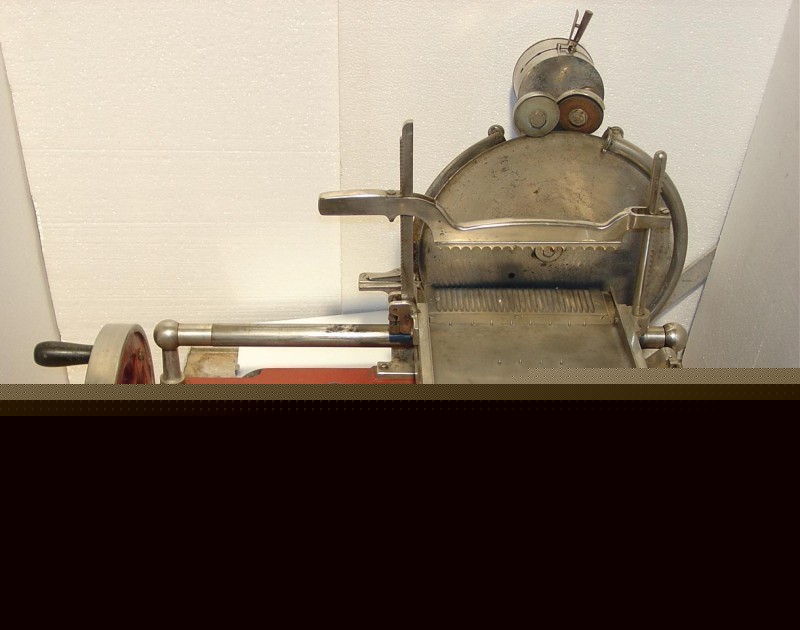 Antique hand crank berkel meat slicer slicing machine