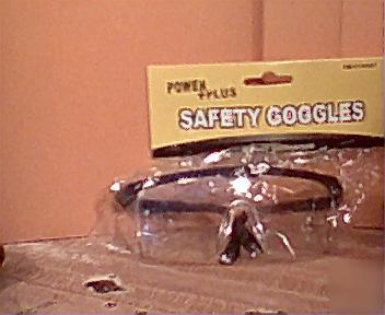 New ridged safety glasses - - adj ear pieces.